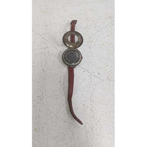 A WW1 stainless steel trench watch with a black dial and Arabic numerals
Location:CAB
If there is no condition report, please request.