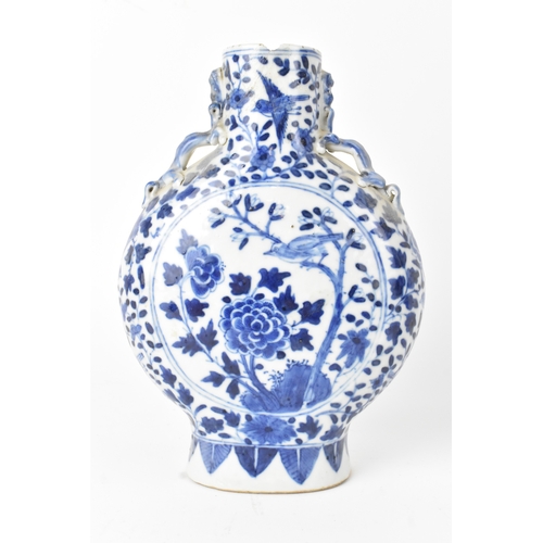 10 - Two Chinese blue and white porcelain moonflasks, Qing dynasty, late 19th century, each of flattened ... 