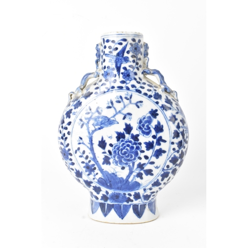 10 - Two Chinese blue and white porcelain moonflasks, Qing dynasty, late 19th century, each of flattened ... 