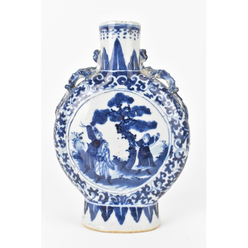 10 - Two Chinese blue and white porcelain moonflasks, Qing dynasty, late 19th century, each of flattened ... 
