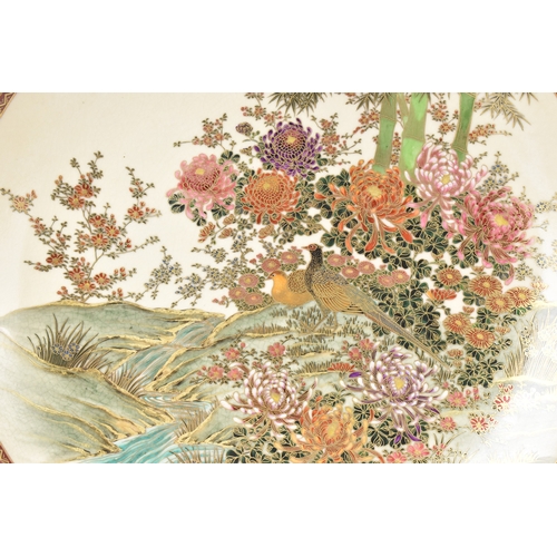 10A - Two Japanese hand-painted Satsuma chargers, mid 20th century, each of circular form and enamelled wi... 