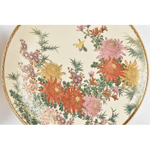 10A - Two Japanese hand-painted Satsuma chargers, mid 20th century, each of circular form and enamelled wi... 