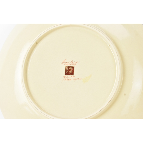 10A - Two Japanese hand-painted Satsuma chargers, mid 20th century, each of circular form and enamelled wi... 