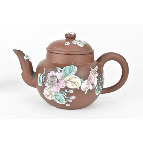 11 - A Chinese Yixing Zisha teapot and a vase, 20th century, the globular teapot with loop handle and sho... 