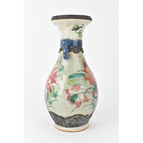 12 - A Chinese famille rose vase, late 19th to early 20th century, of baluster form with flared rim and t... 