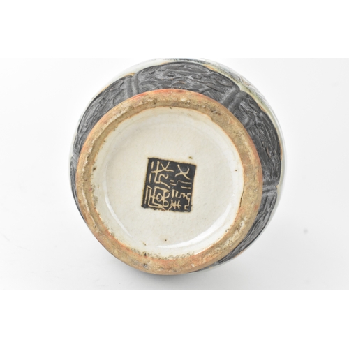 12 - A Chinese famille rose vase, late 19th to early 20th century, of baluster form with flared rim and t... 
