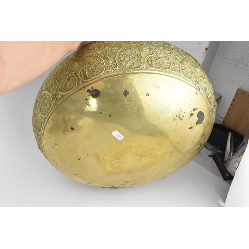 14 - A large Indian brass Paththara ceremonial bowl on elephant stand, early/mid 20th century, the bowl d... 