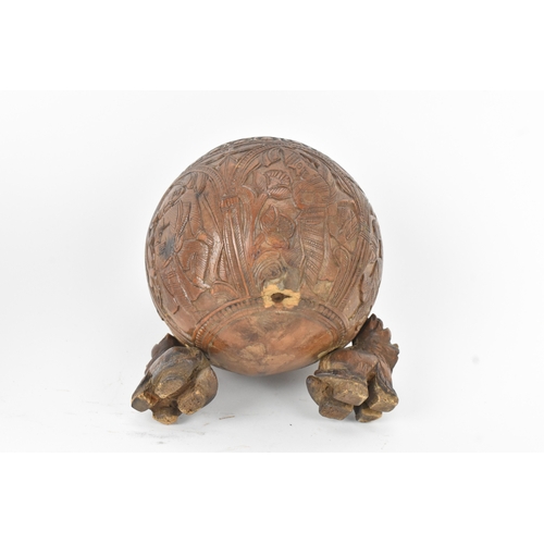 15 - Two Victorian Indian carved coconuts, one applied with Electro silver plate on brass mounts, each ca... 