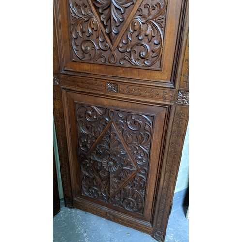 15A - A circa 1900 Chinese carved hardwood five-panel screen, reputedly from Peking Palace, each panel pro... 