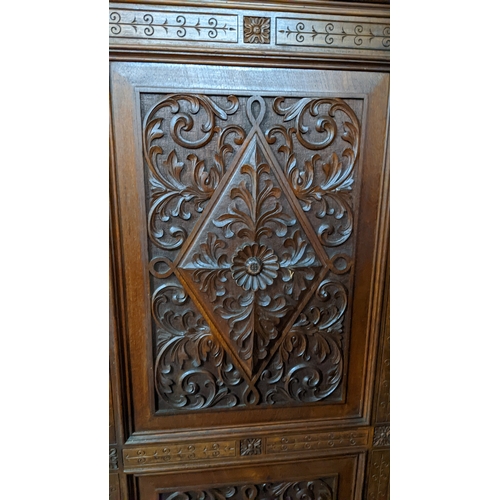 15A - A circa 1900 Chinese carved hardwood five-panel screen, reputedly from Peking Palace, each panel pro... 
