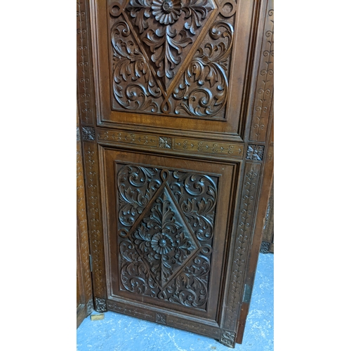 15A - A circa 1900 Chinese carved hardwood five-panel screen, reputedly from Peking Palace, each panel pro... 