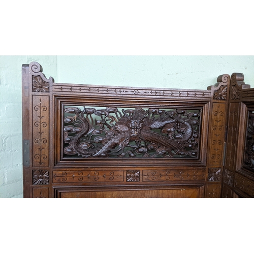 15A - A circa 1900 Chinese carved hardwood five-panel screen, reputedly from Peking Palace, each panel pro... 