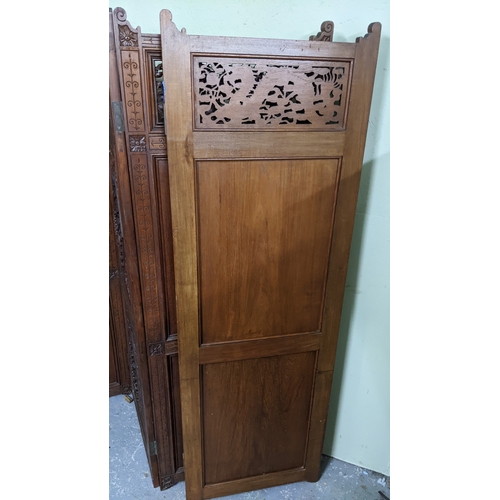 15A - A circa 1900 Chinese carved hardwood five-panel screen, reputedly from Peking Palace, each panel pro... 
