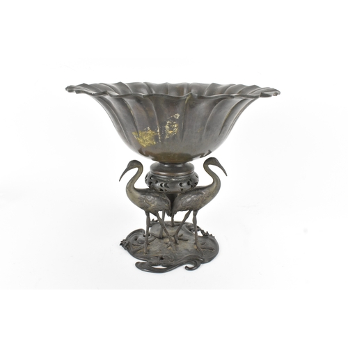 18 - A Japanese bronze bowl / incense burner with crane supports, Meiji period (1868–1912), the flaring l... 