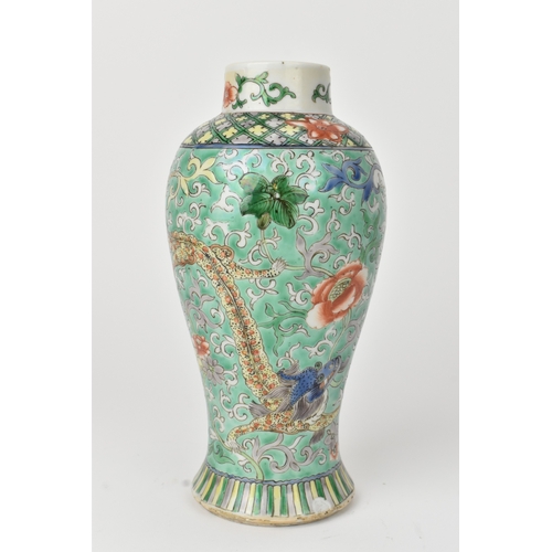 2 - A Chinese famille verte baluster vase, 19th century, enamelled with dragons among peony and scrollin... 