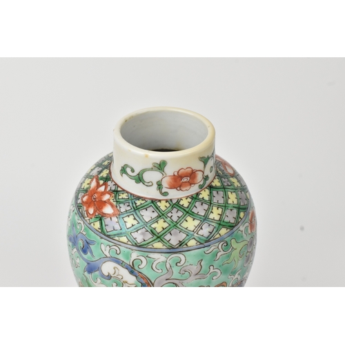 2 - A Chinese famille verte baluster vase, 19th century, enamelled with dragons among peony and scrollin... 