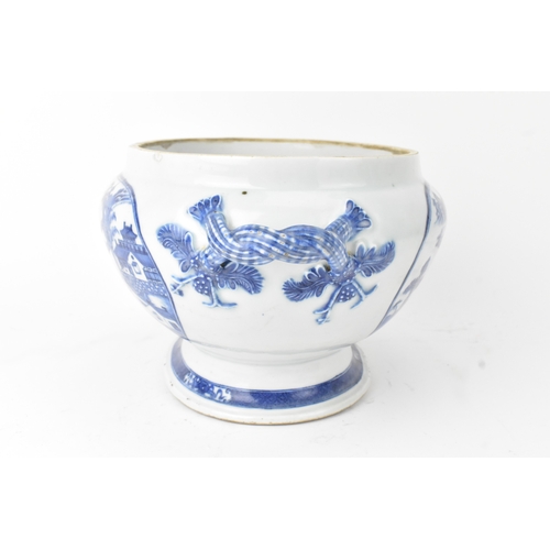 21 - A Chinese blue and white porcelain jardinière, Qing Dynasty, 19th century, of oval form with applied... 