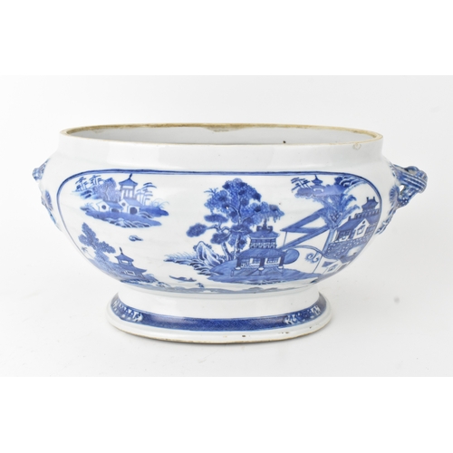 21 - A Chinese blue and white porcelain jardinière, Qing Dynasty, 19th century, of oval form with applied... 