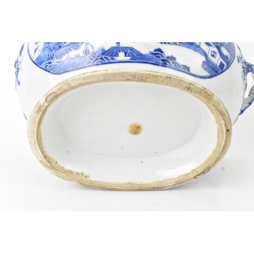 21 - A Chinese blue and white porcelain jardinière, Qing Dynasty, 19th century, of oval form with applied... 