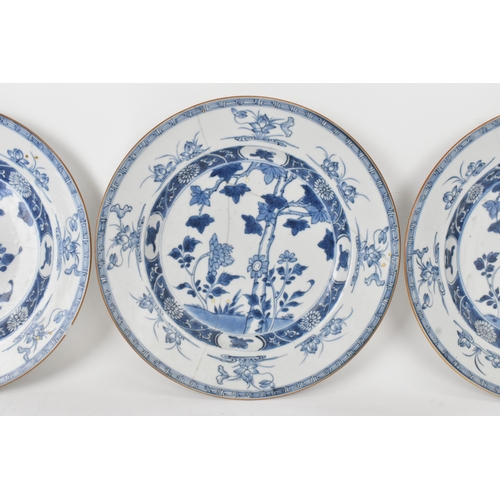 24 - A group of three Chinese export blue and white porcelain dishes, Qing dynasty, Yongzheng to early Qi... 