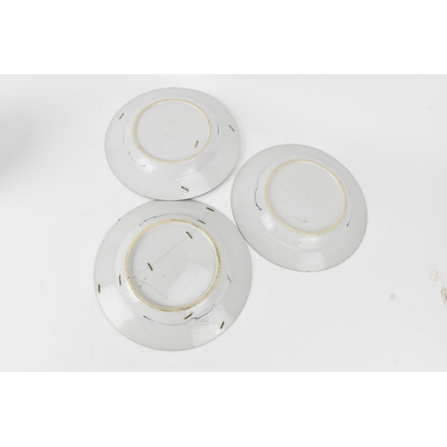 24 - A group of three Chinese export blue and white porcelain dishes, Qing dynasty, Yongzheng to early Qi... 