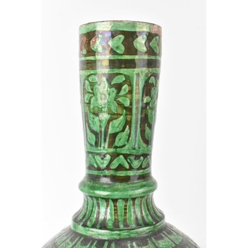 25A - A late 19th cent Indian pottery water bottle vase, circa 1880s, copper green and black glaze over re... 
