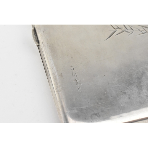 26 - An early 20th century Japanese silver cigarette case, marked 950 Silver, of rectangular form with hi... 