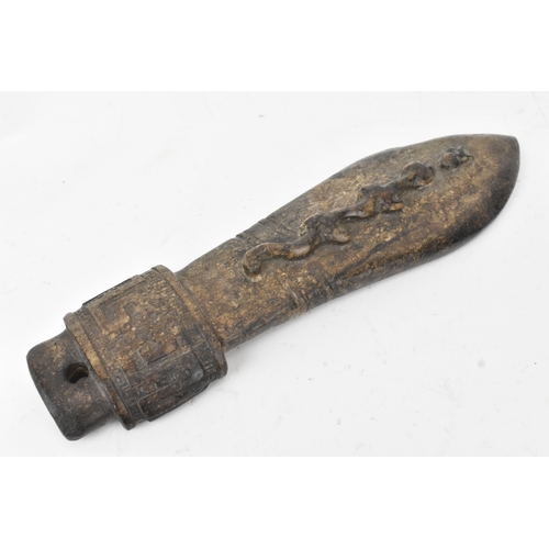 28 - A Chinese carved hardstone figure and an archaistic hardstone blade-form carving, the figure modelle... 