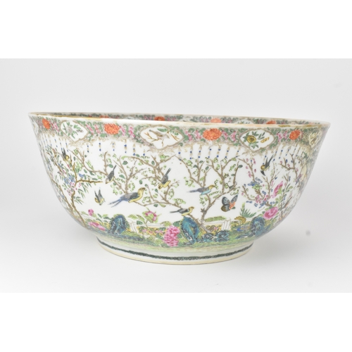 3 - A Chinese export famille rose punch bowl, Qing Dynasty, 19th century, enamelled to the exterior and ... 