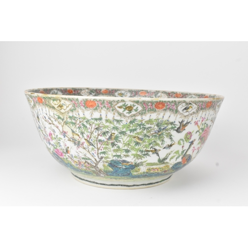 3 - A Chinese export famille rose punch bowl, Qing Dynasty, 19th century, enamelled to the exterior and ... 