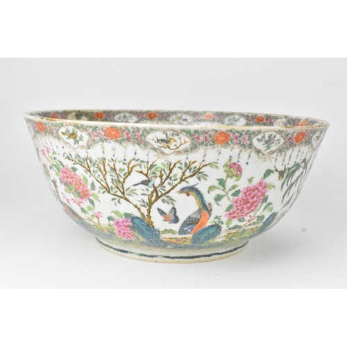3 - A Chinese export famille rose punch bowl, Qing Dynasty, 19th century, enamelled to the exterior and ... 