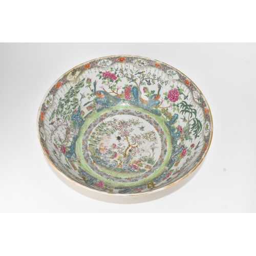 3 - A Chinese export famille rose punch bowl, Qing Dynasty, 19th century, enamelled to the exterior and ... 
