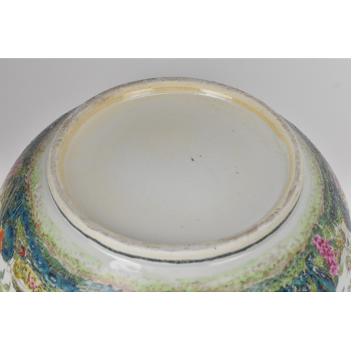 3 - A Chinese export famille rose punch bowl, Qing Dynasty, 19th century, enamelled to the exterior and ... 
