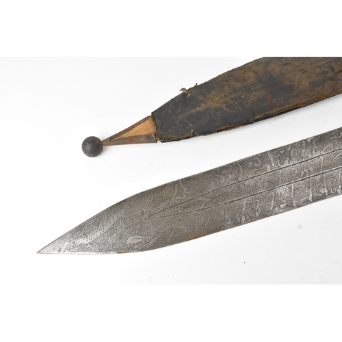 33 - A 19th century Sudanese / North African sword (kaskara type), the broad double-edged steel blade etc... 