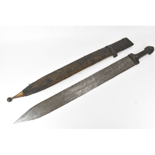 33 - A 19th century Sudanese / North African sword (kaskara type), the broad double-edged steel blade etc... 