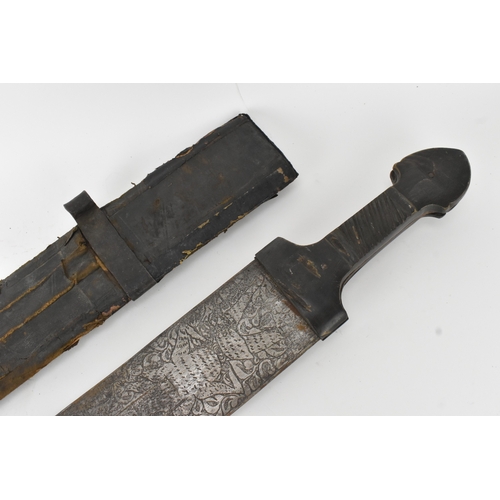 33 - A 19th century Sudanese / North African sword (kaskara type), the broad double-edged steel blade etc... 
