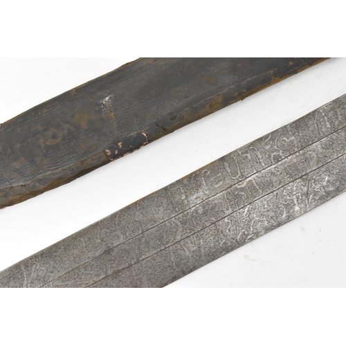 33 - A 19th century Sudanese / North African sword (kaskara type), the broad double-edged steel blade etc... 