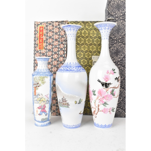 35 - A selection of five Chinese 20th century egg shell porcelain vases, to include a blue and white ovoi... 