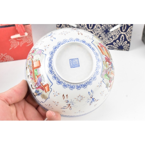 36 - A selection of Chinese egg shell porcelain to include a famille rose millefleur bowl, tea bowl decor... 