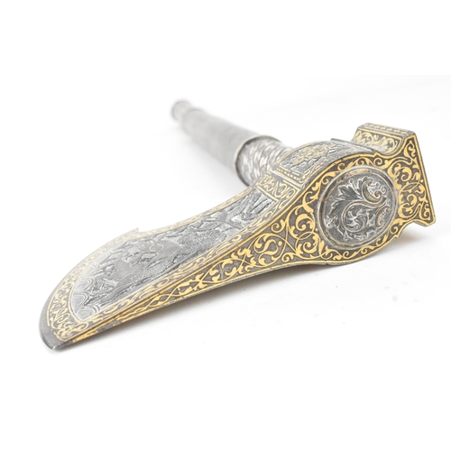 38 - A 19th century Indo-Persian 'tabarzin' saddle axe, the steel head decorated with a hunting scene dep... 