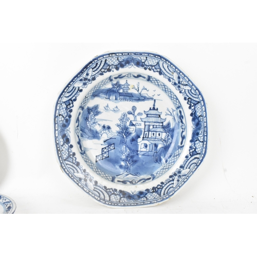 40 - A group of three Chinese blue and white porcelain dishes, Qing Dynasty, comprising: an octagonal exp... 