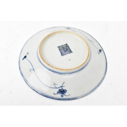 40 - A group of three Chinese blue and white porcelain dishes, Qing Dynasty, comprising: an octagonal exp... 