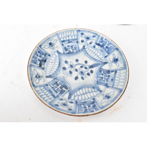 40 - A group of three Chinese blue and white porcelain dishes, Qing Dynasty, comprising: an octagonal exp... 