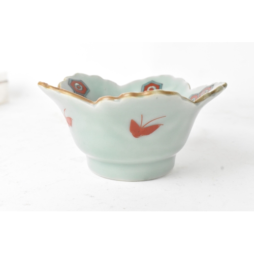 45 - A Japanese porcelain lobed bowl, late Edo/early Meiji period, hand painted with a crane in flight am... 