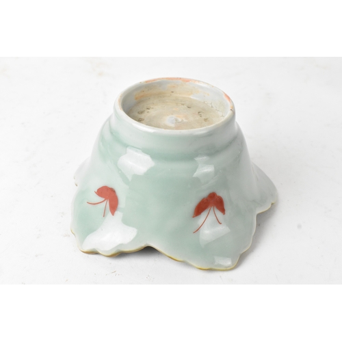 45 - A Japanese porcelain lobed bowl, late Edo/early Meiji period, hand painted with a crane in flight am... 