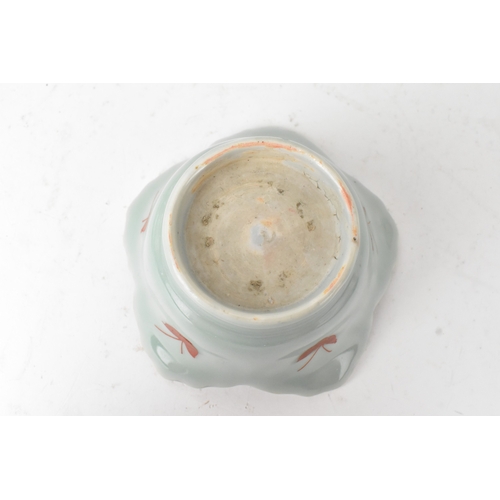 45 - A Japanese porcelain lobed bowl, late Edo/early Meiji period, hand painted with a crane in flight am... 