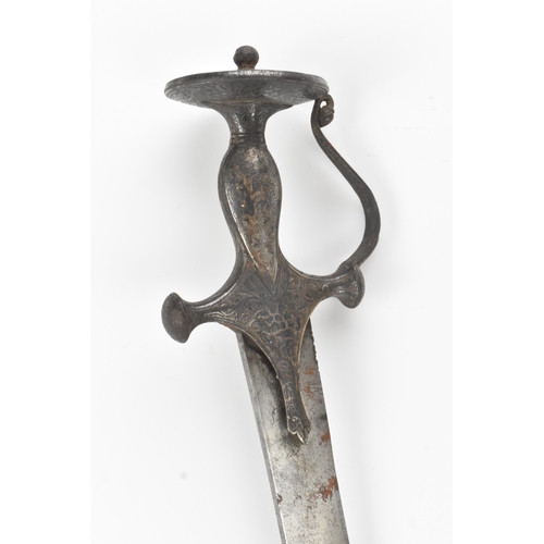 47 - A 19th century Indian tulwar sword, the curved single-edged steel blade with a disc pommel hilt, eng... 