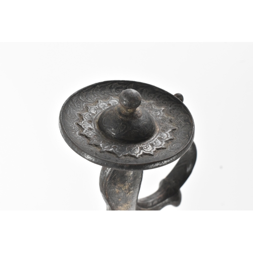 47 - A 19th century Indian tulwar sword, the curved single-edged steel blade with a disc pommel hilt, eng... 
