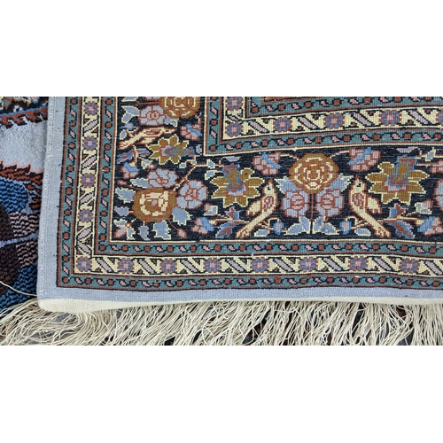 48 - A Persian part silk rug, with central mihrab design flanked by flowering columns, stylised vases, tr... 