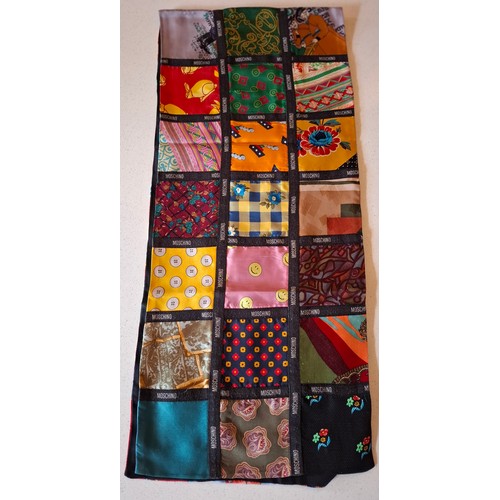 35 - Mixed fashion accessories to include a Moschino patchwork silk scarf with designer name to black bor... 